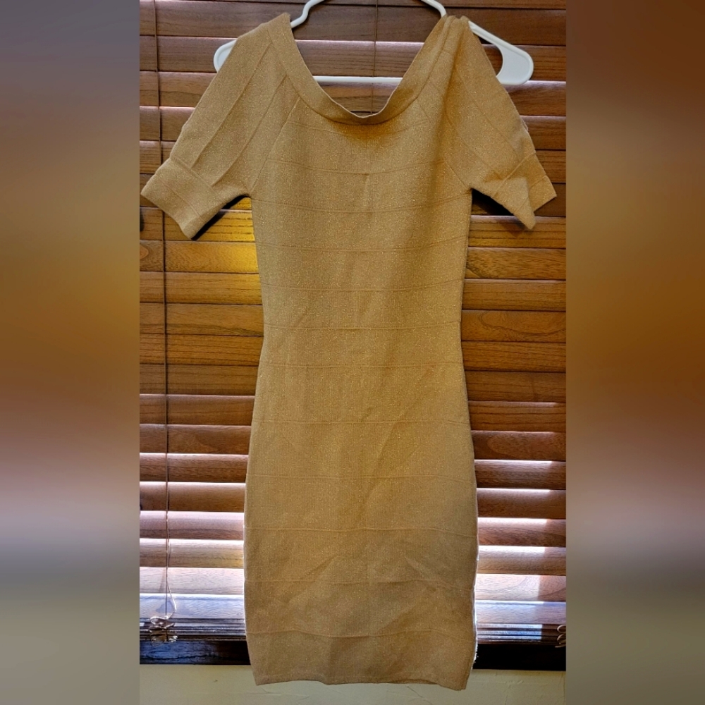 Gold bebe bodycon bandage dress in shiny gold